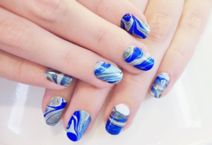 Abstract Details on blue nail art design